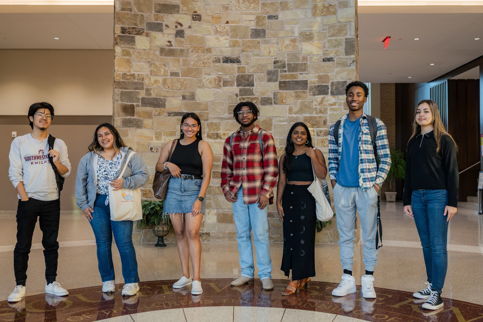 SWAU Students smiling at Moore building