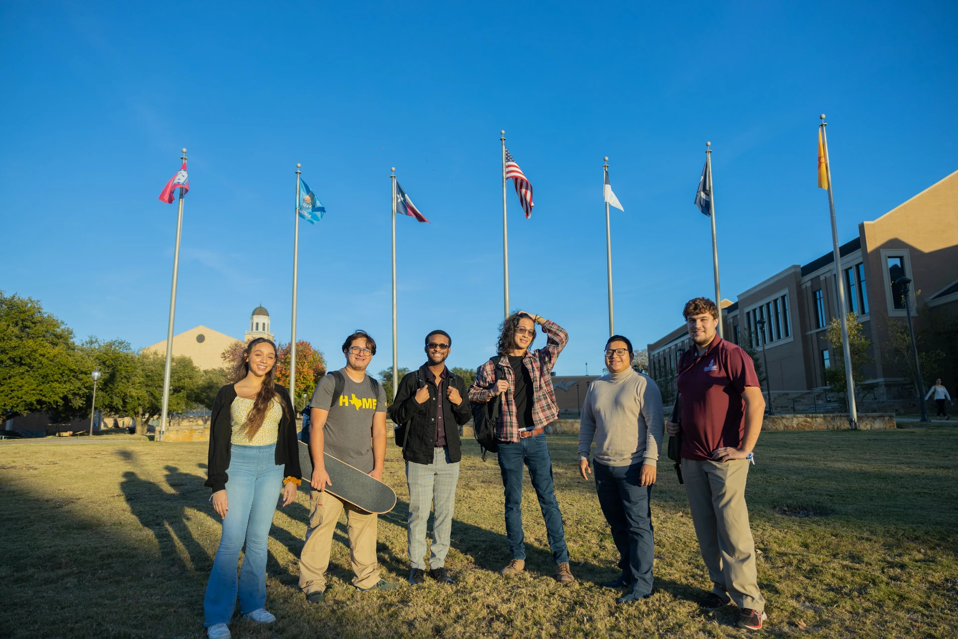 students smiling outside fall semester SWAU III